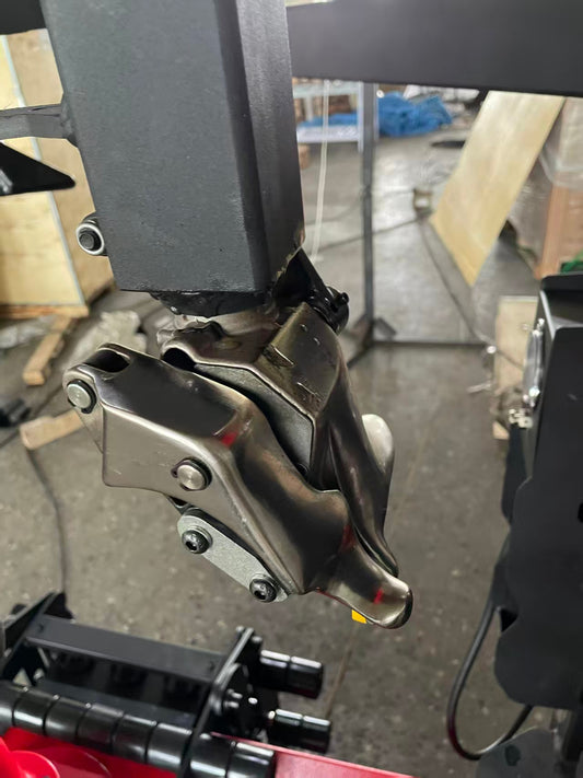 Tire changer flips bird head